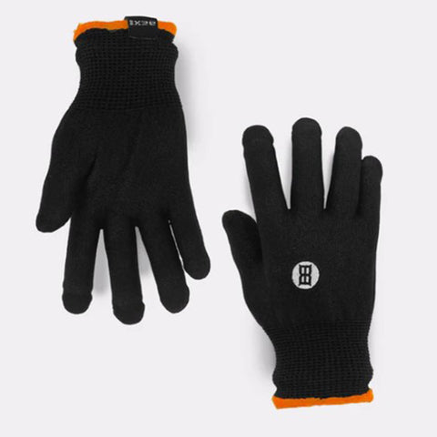 Youth black bex roping glove. They have a white bex logo on top of the hand and a orange strip at the base.