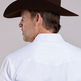 Close up view of the back of the shirt, it features  western yoke. 