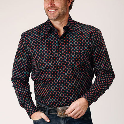 Black pearl snap shirt with small red roses, black snaps, two front pockets, and two western yokes. 
