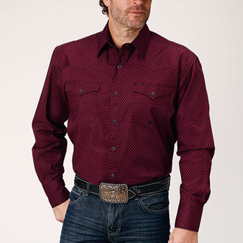 Dark red shirt with small black diamond print. Shirt is a long sleeve with two front pockets and black pearl snaps. 
