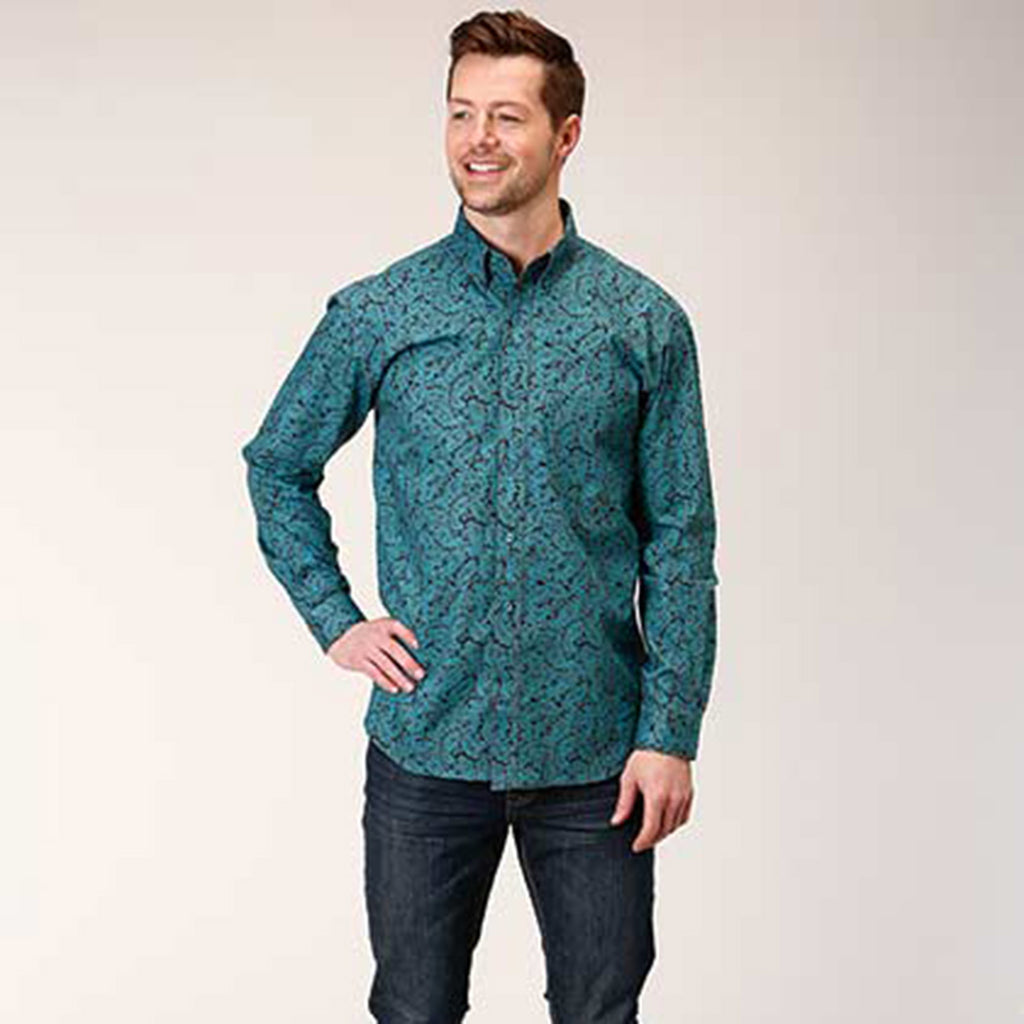 Blue button down shirt with chocolate paisley print. 