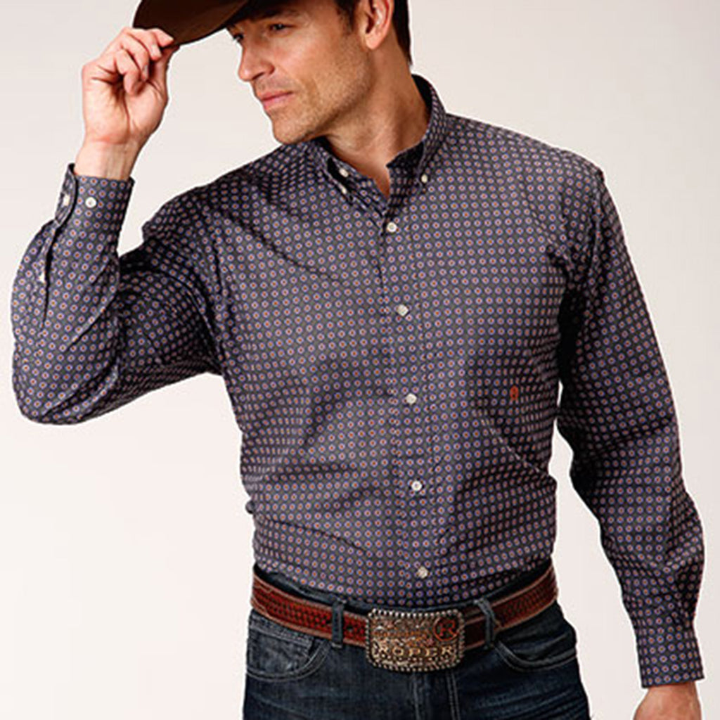 Purple long sleeve button down shirt with white buttons and pink foulard print. 