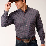 Purple long sleeve button down shirt with white buttons and pink foulard print. 