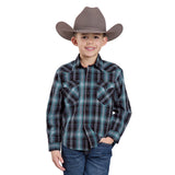 Boy wearing a teal and black large plaid long sleeve shirt