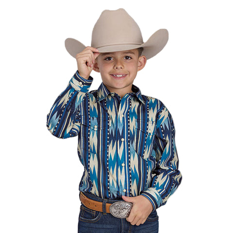Boy wearing a blue and cream vertical aztec print long sleeve shirt