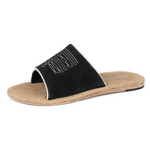 Black suede boot stitch slide sandal with Western‑inspired stitching and a soft suede texture shown from a front angle.