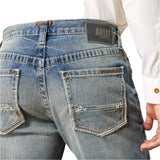 close up of light blue jeans with white stitching