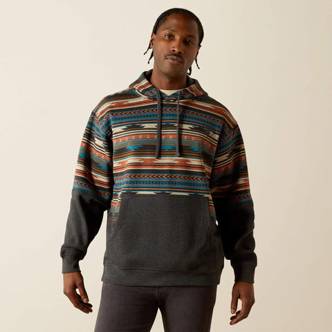 Brown, grey, blue, and orange men's Aztec print Hoodie. Aztec print is on the top half and the bottom half is plain grey. Hoodie has large front pouch pocket and hoodie strings. 