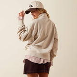 Back view of women’s oatmeal heather Ariat top with a clean, casual design.