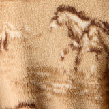 Close up of Ariat women’s Wild Horses Print top in Tiger’s Eye featuring a wild horse pattern and Western-inspired design.