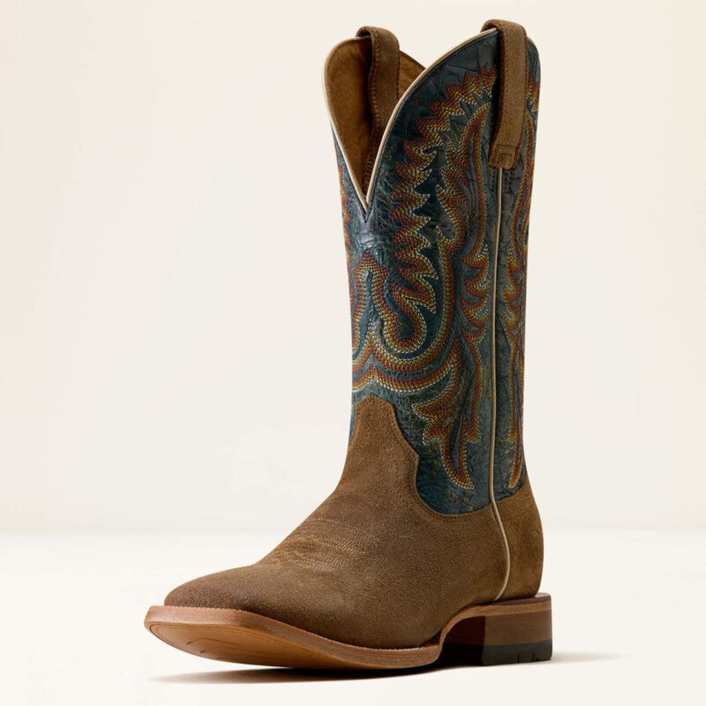 Front view of Ariat Slatewood wide square toe cowboy boot in Timber Tan Roughout with Electric Wave detailing, showing the heel and 13-inch shaft.