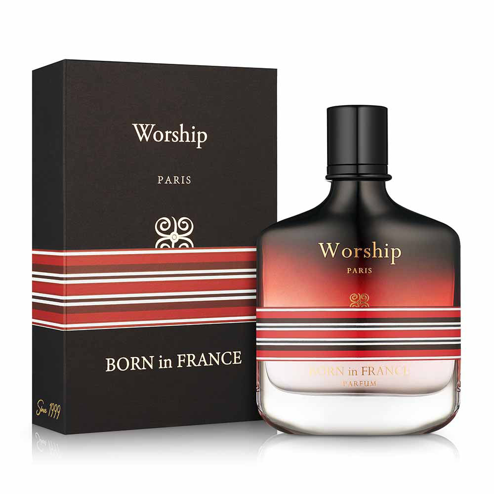 Bottle and box view of Worship Cologne with red and black stripes incorporated across the ombre red bottle. 