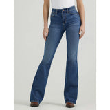 Person in high-rise, dark blue flared jeans with five-pocket styling and button closure