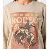 women's beige/cement colored sweatshirt with spirit of the west rodeo graphic on front-close up view of graphic