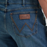 Close back pocket view of Wrangler Men's Retro Relaxed Bootcut Jeans