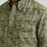 Close up view of the shirt print. Buttons are brown and beige. 