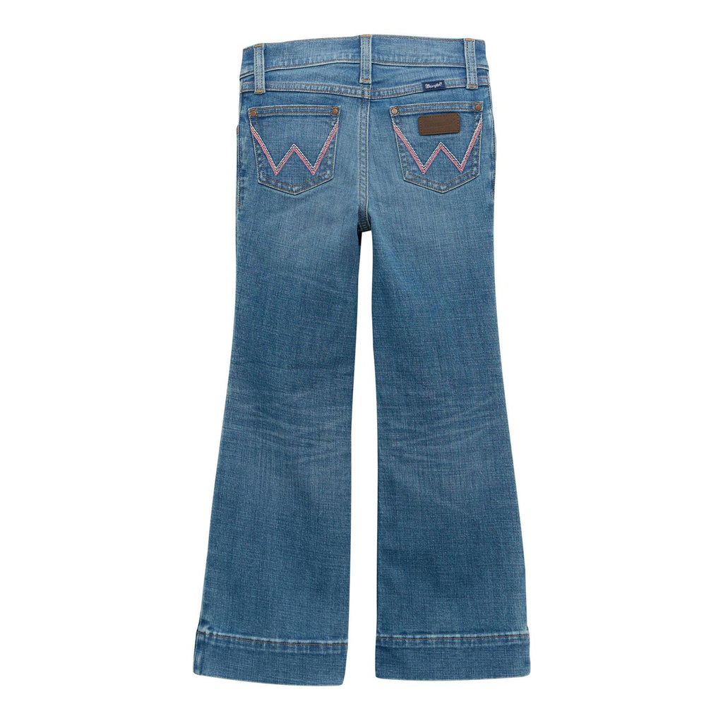 Back view of a light wash pair of girls jeans featuring an embroidered pink "W" stitched on back pockets