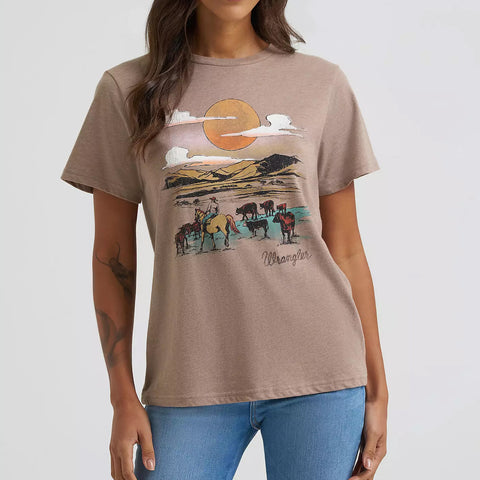  Model wearing Wrangler Women’s Desert Landscape Scene Tee, showing bold desert graphic and classic fit.