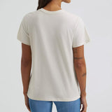 Back view of model wearing Wrangler Women’s Cream Longhorn Tee, showing clean cream design and relaxed fit.