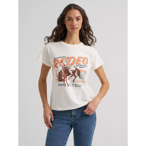 Model wearing the Wrangler women’s Bronc Rodeo Giddy Up tee, front view showing the bold bronc rider graphic, Western lettering, and relaxed everyday fit.