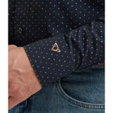 Model showing mitered cuffs and COJO’s signature embroidered logo.