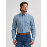 Model wearing the Wrangler Men’s Cody Johnson performance button down Western shirt, front view.