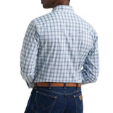 Back view of a model wearing the men’s wrinkle resist white and grey Western snap plaid shirt, showing the Western back yoke, clean plaid pattern, and relaxed fit.