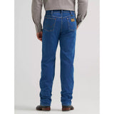 Back view of a model wearing Wrangler Cowboy Original Tough Lite stone wash jeans, showing the Western yoke, back pockets, and work‑ready fit.