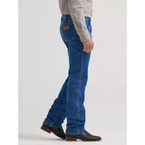 Side view of a model in Wrangler Tough Lite stone wash jeans, highlighting the durable lightweight denim, relaxed thigh, and straight‑leg profile.