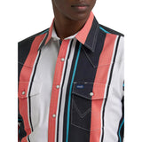Close‑up of the Wrangler men’s coral multi striped Brushpopper shirt, showing the textured cotton fabric, snap details, and retro stripe design.