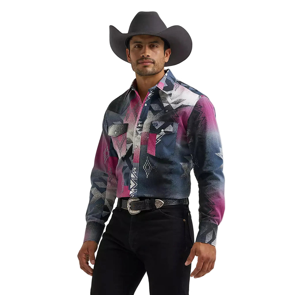 Model wearing the Wrangler Men’s Vintage Southwestern long sleeve shirt, front view showing the geometric Southwestern pattern, snap placket, and classic Western fit.