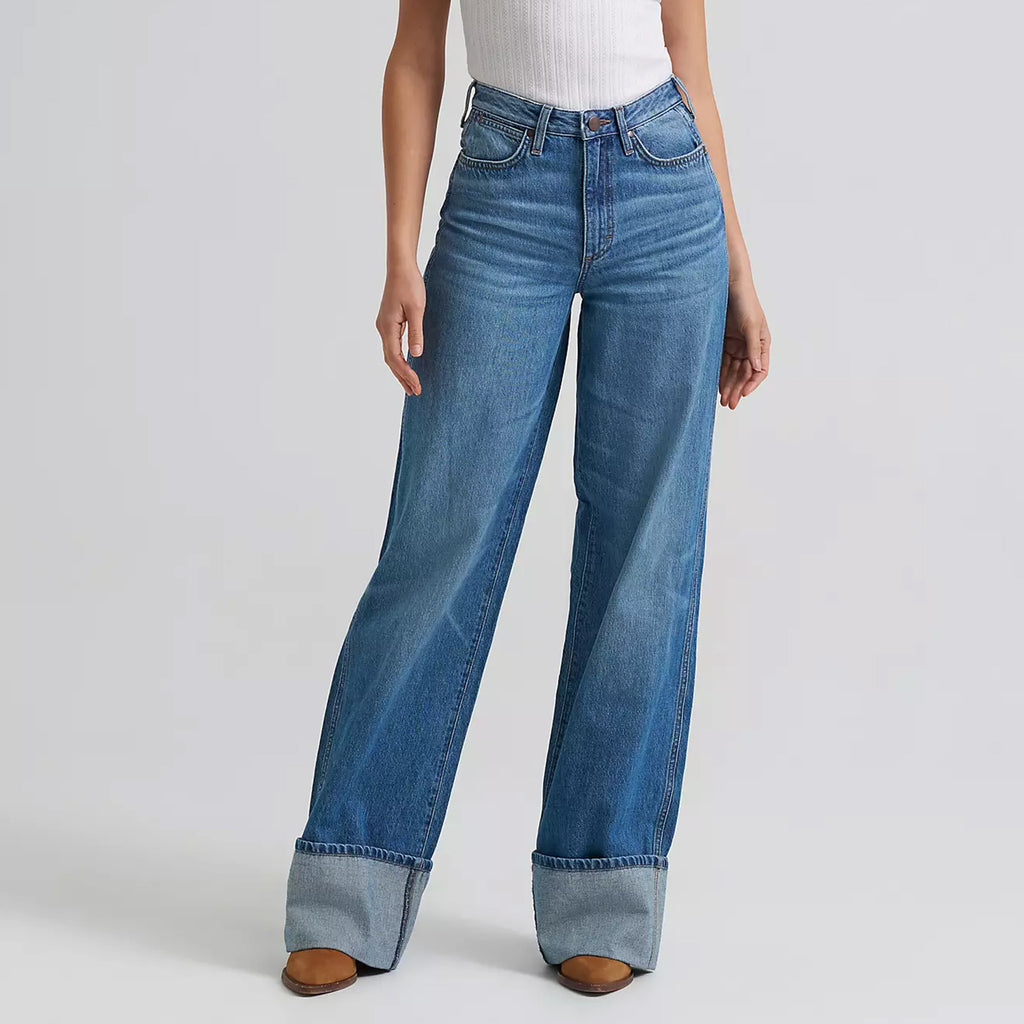 Model wearing the Wrangler Women’s Bailey high rise wide leg cuffed jean, front view showing the flattering waist, wide leg shape, and polished Western style.