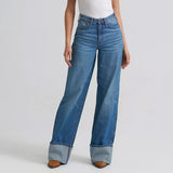 Model wearing the Wrangler Women’s Bailey high rise wide leg cuffed jean, front view showing the flattering waist, wide leg shape, and polished Western style.