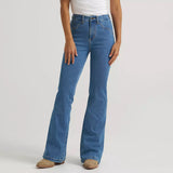 Model wearing the Women’s Wrangler BESPOKE High Rise Fashion Flare Jean, front view showing the high‑rise waist, smooth flare leg, and refined Western fit.