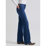 Side view of a model in the Wrangler Destiny Bespoke bootcut jean, highlighting the contoured waist, sleek bootcut leg, and refined Western silhouette.