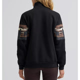Back view of a model wearing the Wrangler Wild West 1/4 zip pullover, showing the clean back design, relaxed fit, and soft fleece drape.