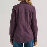 Back view of a model wearing the Wrangler burgundy retro stripe long sleeve shirt, showing the Western back yoke, clean stripe alignment, and flattering slim fit.