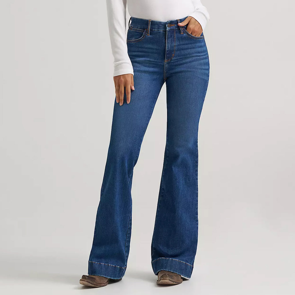 Model wearing the Women’s Wrangler BESPOKE high rise trouser jean, front view showing the tailored waist, smooth trouser leg, and polished Western‑inspired fit.