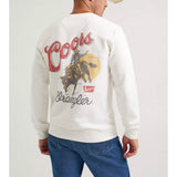 Back of model wearing long sleeve graphic tee with a Bull rider, Coors and Wrangler