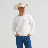 Front of model wearing long sleeve tee with Wrangle/Coors on the chest 