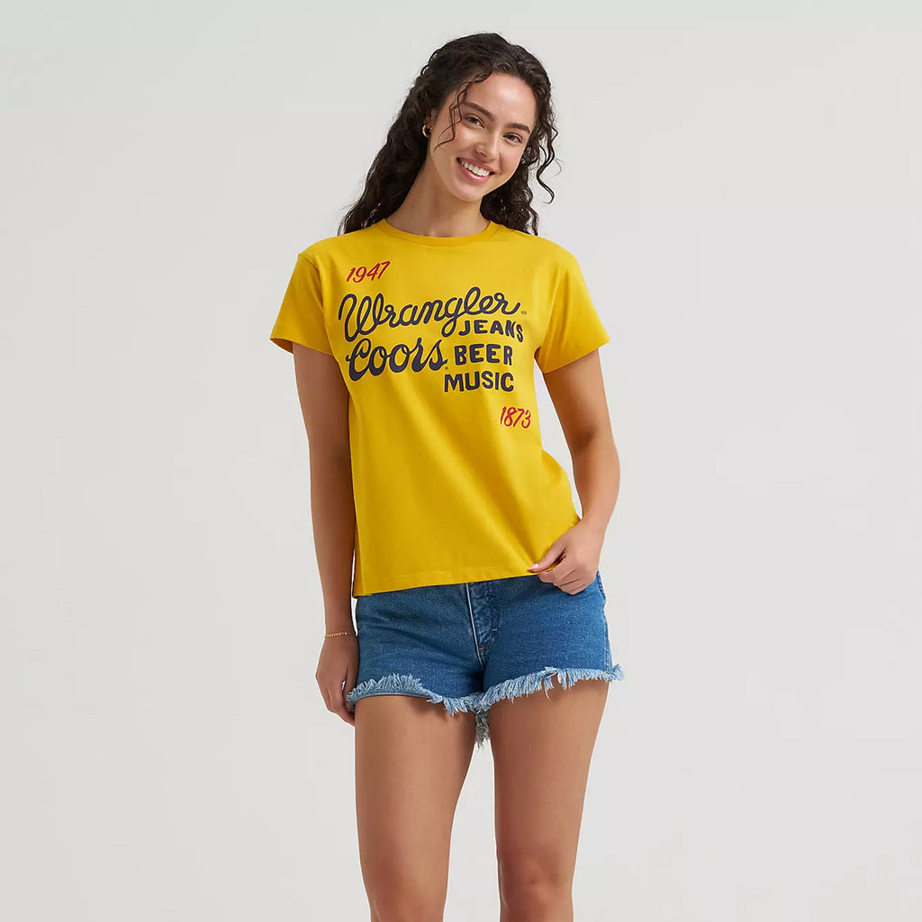 Model wearing a Yellow Wrangler Women's Coors Music Tee