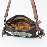 Open view of the inside of the bag, one zipper pocket and two pockets with no closure. 