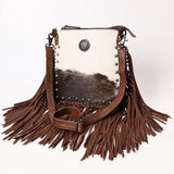 Brown and white hide purse with brown leather fringe