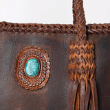 Close up of braided leather and turquoise stone