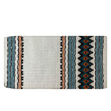 cream colored wool blanket with blue and orange navajo design