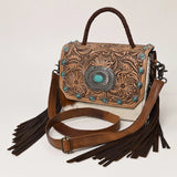 Floral tooled boxy purse with hide and silver and turquoise stones on the flap 