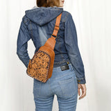 style view of tooled sling bag