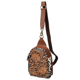 Tooled and Cowhide Sling Backpack with brass finishes