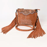 Brown suede crossbody bag with tooled top and fringe detail.