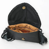 Black fringe purse with zipper size pocket and side open pocket with snap closure on flap